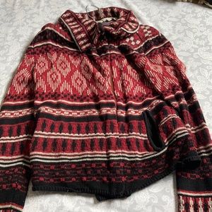 Red and black patterned knit zipped sweater